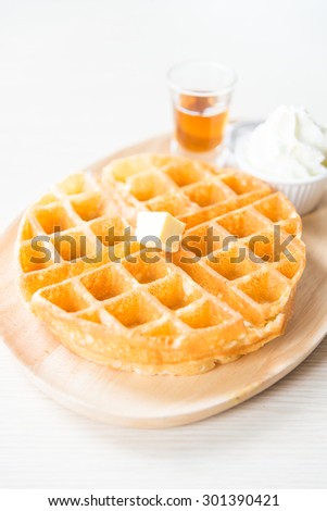 Waffles with butter and honey sauce