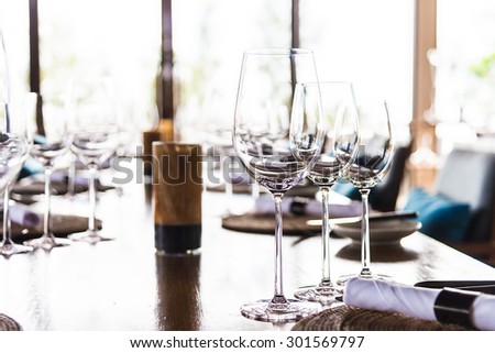 Selectiv soft focus on Wine glass on dining table in restaurant