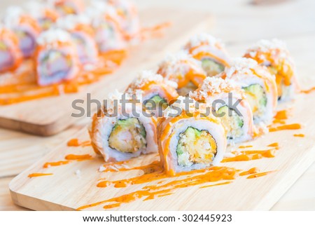 Selective focus point on Salmon sushi roll , traditional japanese food style