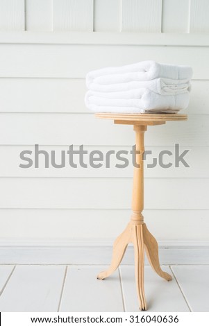 Towel bath on wood table