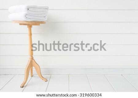 Towel bath on wood table