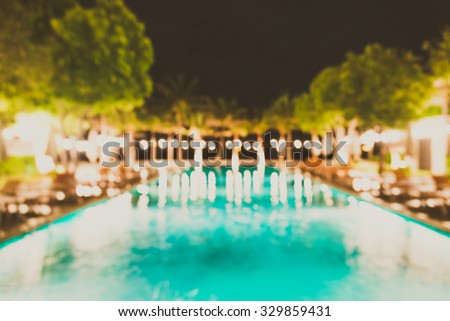 Abstract blur swimming pool in hotel resort background - vintage filter effect
