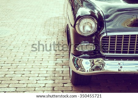 Selective focus point on Headlight lamp car - vintage filter