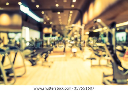 Abstract blur fitness gym room interior background - Vintage filter