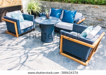 Outdoor patio with empty chair and table - Vintage Light Filter