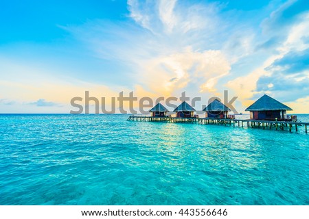 Beautiful tropical Maldives resort hotel and island with beach and sea on sky for holiday vacation background concept -Boost up color Processing
