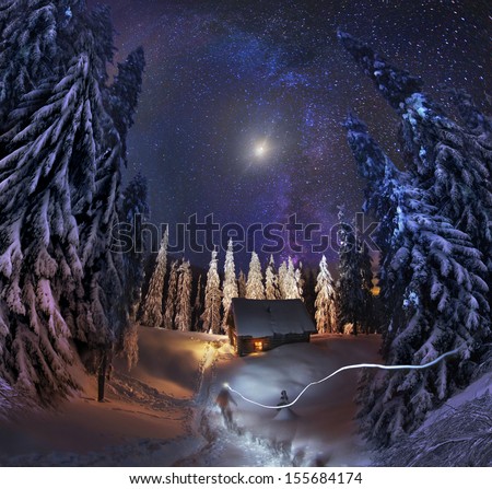 Traveling Through The Winter Mountains, Bold And Romantic People Can Find Shelter In The Hunting Huts, Glued To The Panorama At A Slow. The Milky Way As Smoke Rises Over The Frozen Nature...