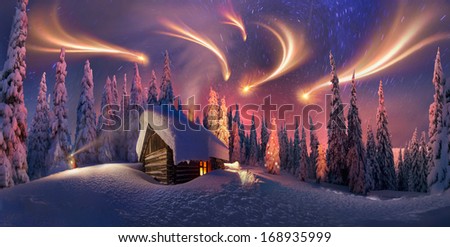 Climbing to tourist wild alpine mountain to an abandoned cabin-in order to illuminate the snow-covered spruce canopy during moonrise, moonset, to see the first star of Christmas in the Carpathians.
