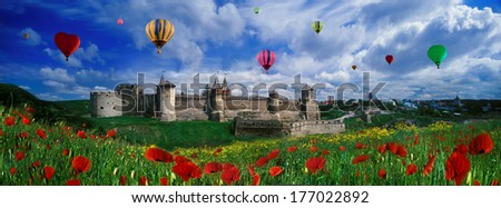 Historical accounts date the Kamianets-Podilskyi Castle to the early 14th century. The beauty of summer nature, meadows with flowers, in front of the ancient fortress inspires joy