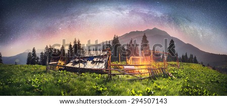 High in the mountains of the shepherds of sheep and cows build home- seekers and summer graze cattle in wild fields and forests of the Carpathians. Night pasture fantastically fabulous