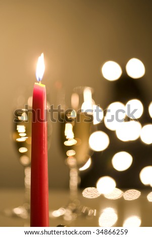 SEASONAL IMAGE-two glasses of Champagne with a romantic candlelight