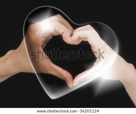 GRAPHIC IMAGE-a crystal heart and couple's hands shaped with heart