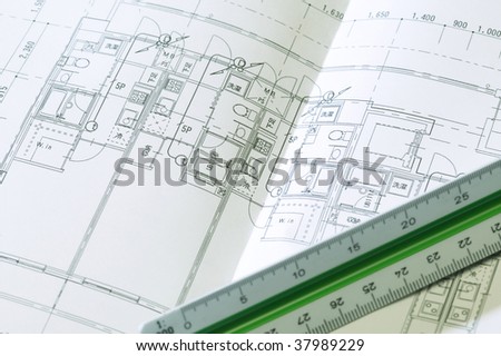 Drawing sheet and measurement on the floor.