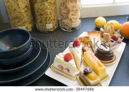 A plate of assorted cake on the table