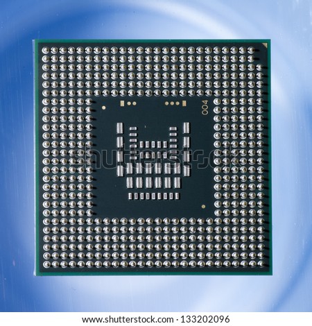Computer CPU on a blue light background