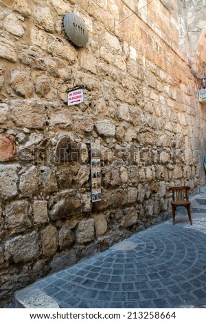 JERUSALEM,ISRAEL - JULY 25: Via Dolorosa on July 25,2014 in Jerusalem.The way in Old City of Jerusalem, held to be the path that Jesus walked, carrying his cross, on the way to his crucifixion.