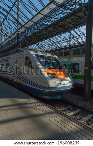 HELSINKI - APRIL 19: Allegro train (Saint Petersburg, Russia - Helsinki, Finland) on April 19, 2014. Allegro first high-speed train from Russia to Europe.