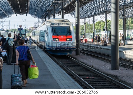 HELSINKI - JULY 19: Allegro train (Saint Petersburg, Russia - Helsinki, Finland) on July 19, 2014. Allegro first high-speed train from Russia to Europe.