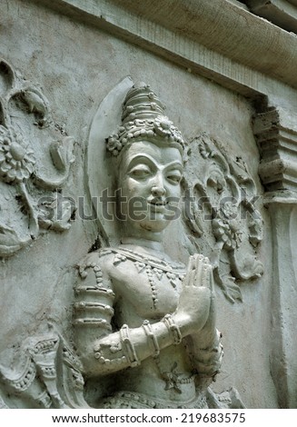 brick wall decorate about Buddha\'s biography in temple wall, thailand