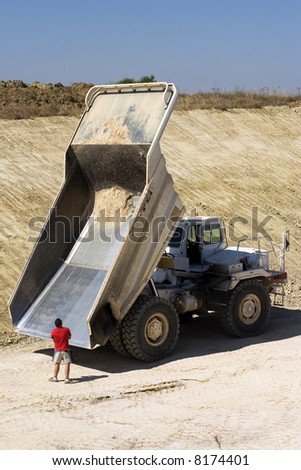 Man and construction truck