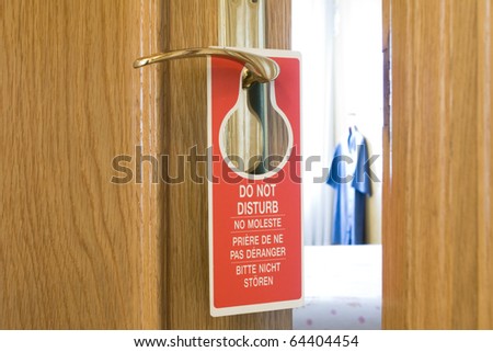 Do Not Disturb sign on a hotel room door