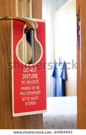Do Not Disturb sign on a hotel room door