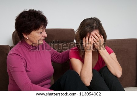 Problems - senior mother comforts daughter
