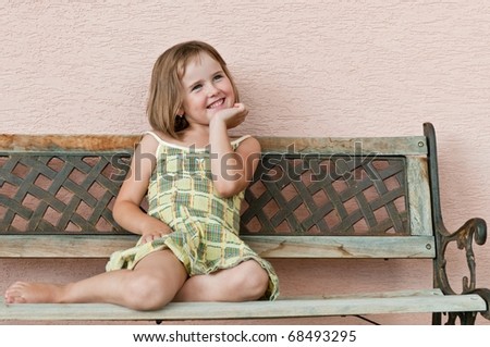 Outdoors portrait of small cute child - natural smiling expression