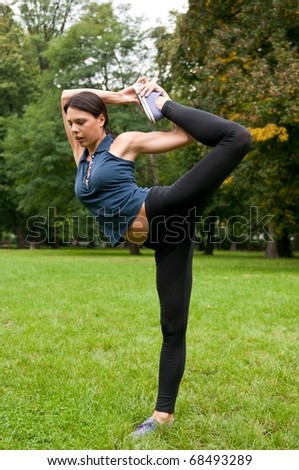 Woman stretching muscles before jogging