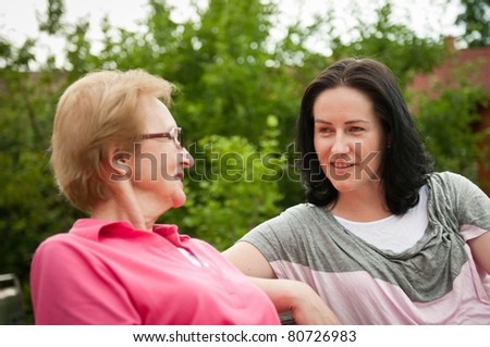 Outdoors talking - women