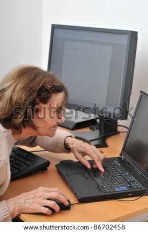 Never old enough - senior woman with computer