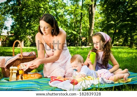 Picnic - mother with children in park