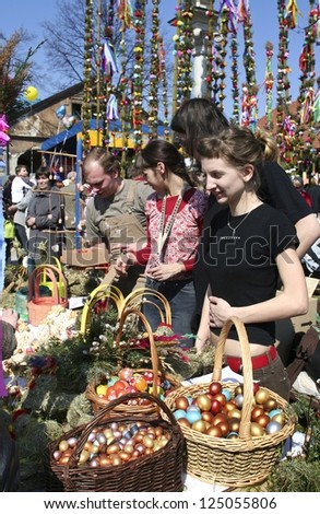 LIPNICA, POLAND - APRIL 01: Easter Palm Contest in Lipnica, Poland, annual event of Palm Sunday. Craftsmans selling products while accompanying bazaar. April 01, 2012 in Lipnica, Poland.