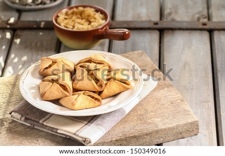 Pastry filled with cabbage, cabbage pie in square shape. Selective focus