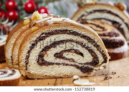 Poppy seed cake in christmas setting. Selective focus