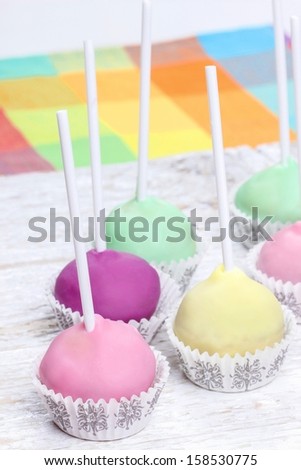 Cake pops in pastel colors, sweet dessert for kids