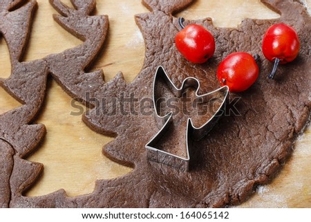 Preparing gingerbread cookies for christmas. Steps of making biscuits