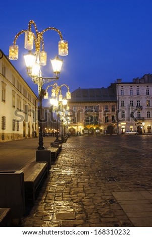 Krakow - December 21: City Center By Night: Ancient Temements . Maly Rynek Square, Krakow, Poland On December 21, 2013.