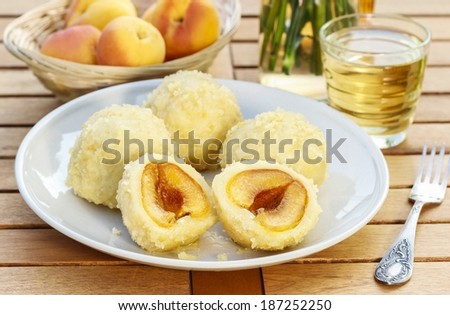 Apricot in pastry, popular austrian dish. Garden party table