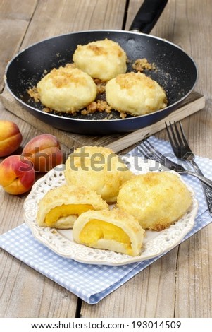 Peach in pastry, popular austrian dish. Garden party table
