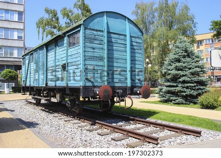 KRAKOW,POLAND - JUNE 08, 2014: AGH University of Science and Technology -  the largest technical university in Poland. Outdoor exhibition of vintage trains at the campus.