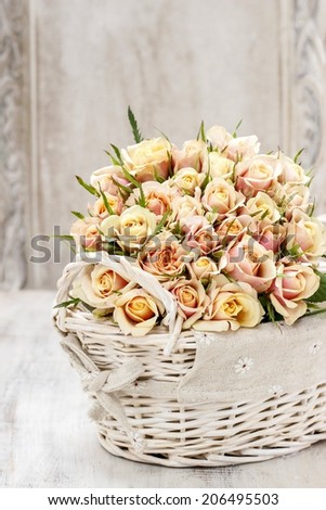 Bouquet of roses in wicker basket