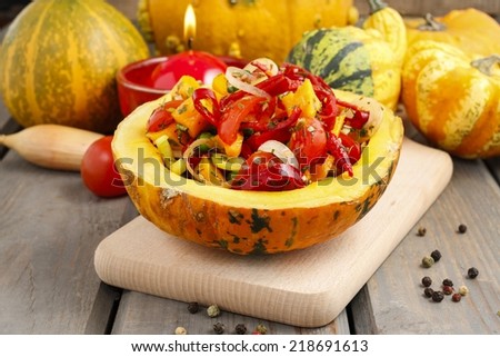 Vegetable salad served in pumpkin