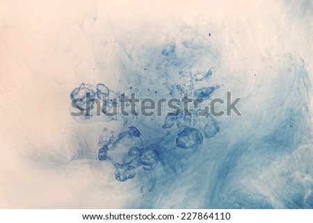 Paint in water - abstract background