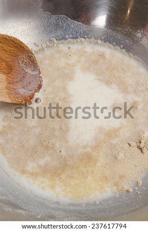 How to make yeast dough - step by step: mix dry yeast with milk and sugar