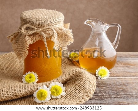 Jug and jar of honey