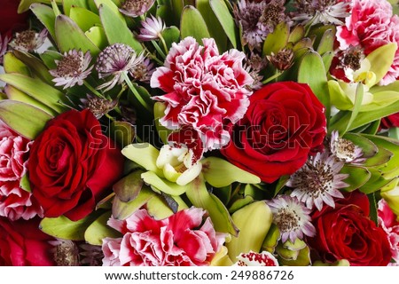 Bouquet of orchid, rose and carnation flowers