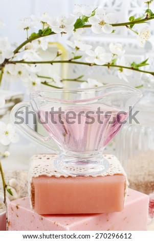 Pink spa set: bars of handmade natural soap, liquid soap, sea salt and essential oils