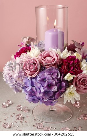 Floral arrangement with roses, peonies and hortensias.