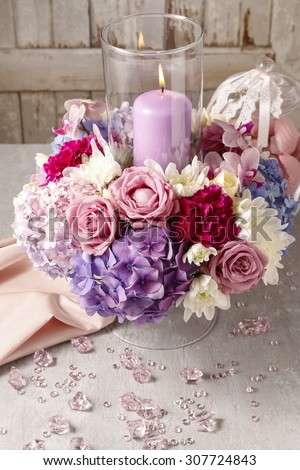 Floral arrangement with roses, peonies and hortensias.